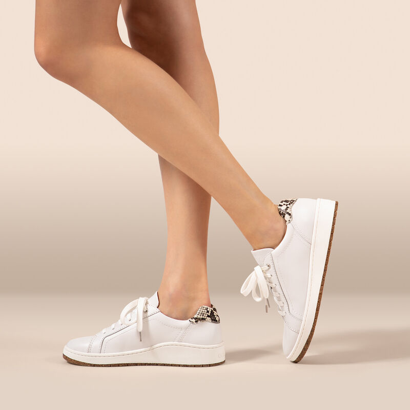 white genuine leather sneaker on foot